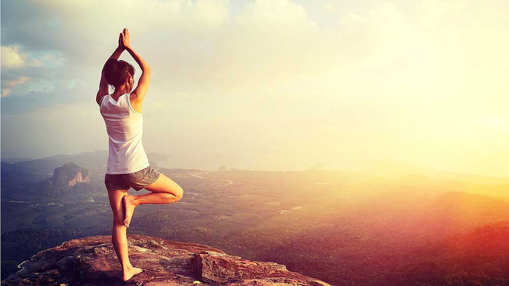 Government goes out of the way to promote Yoga, offers e-Tourist Visa image